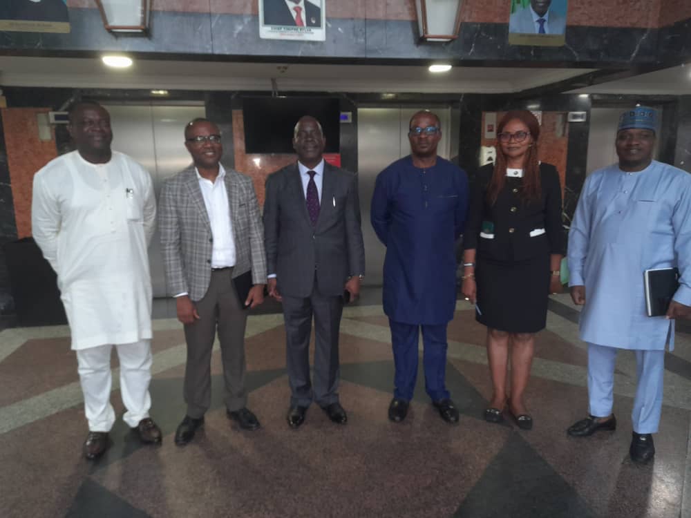Photo News: Engr. Babatunde Ogunade, Manager Development, Mr. Abel Nsa, Head NOGEC,  Commission Chief Executive (CCE), Nigerian Upstream Petroleum Regulatory Commission (NUPRC) Engr. Gbenga Komolafe, Mr. Paul Osu, Head Lagos office, Mrs. Juliet Okoro, Manager Services and Mr. Babangida Umar, Technical Assistant to the CCE during  the working visit of the CCE to NUPRC Lagos office recently.